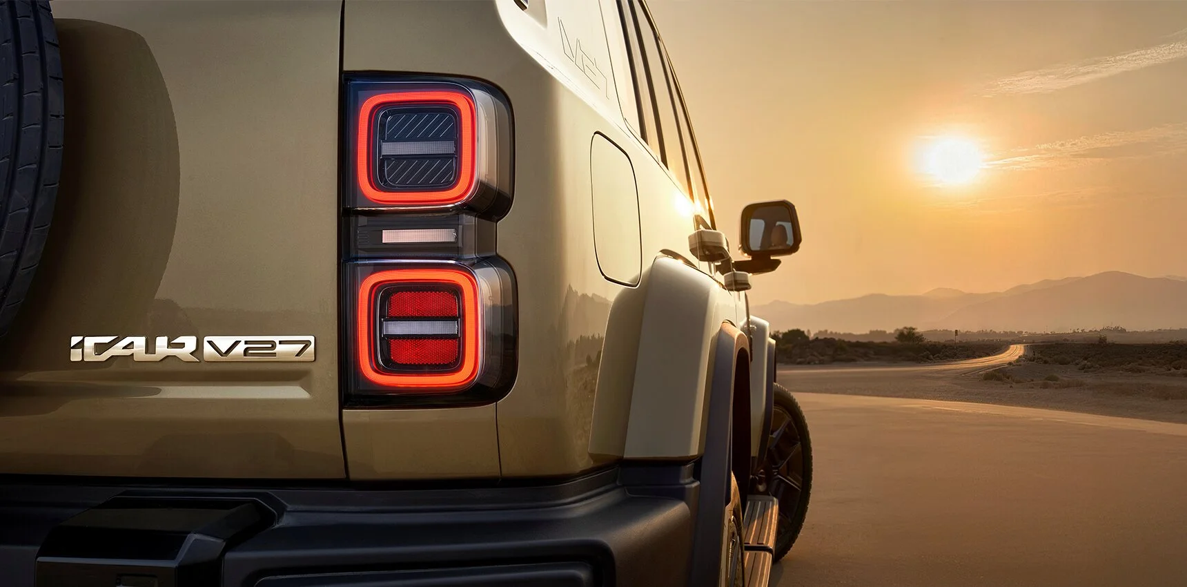 iCAUR V27 rear lighting and badge at sunset